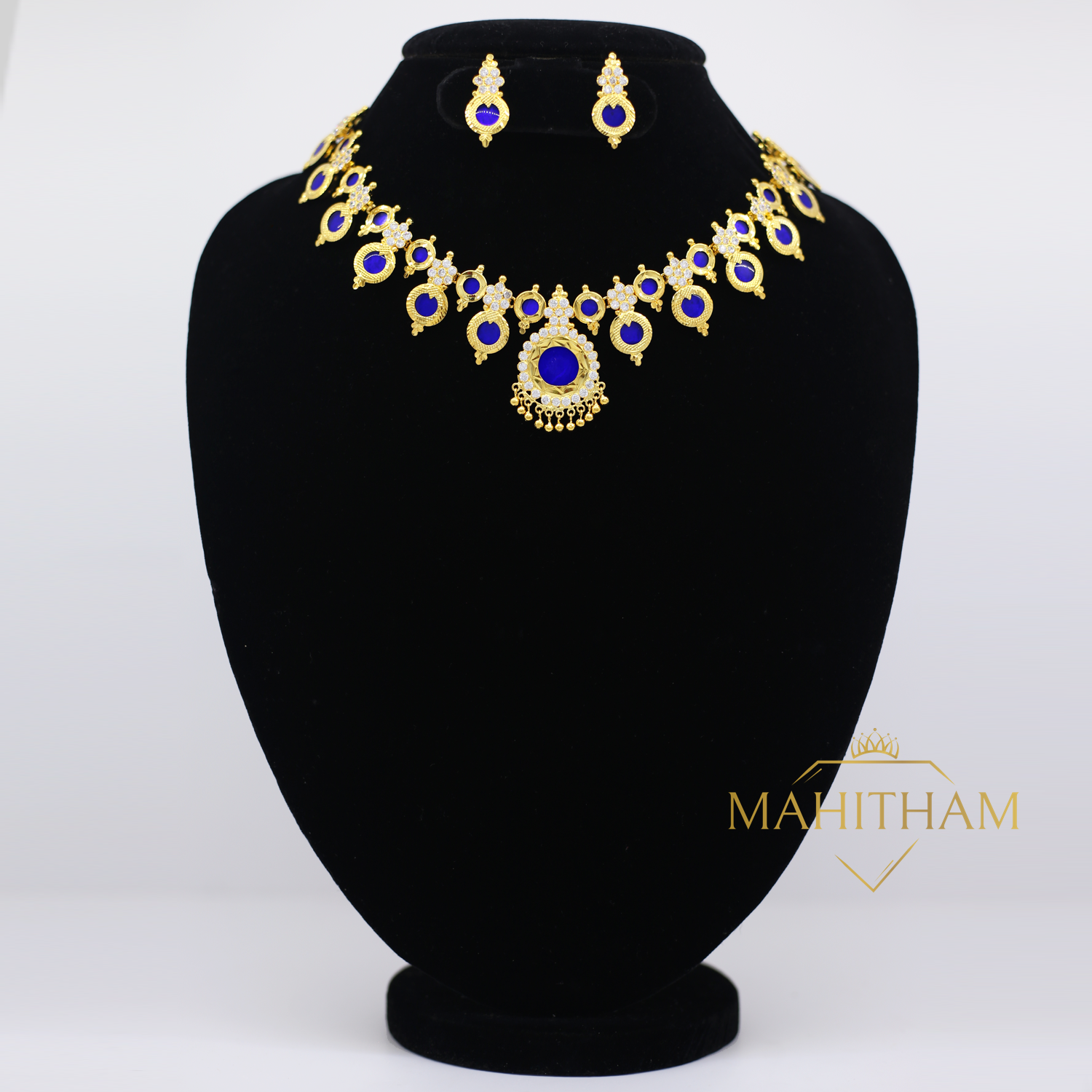 DREAMJWELL - Gold tone lakshmi blue stone designer necklace set dj-341 –  dreamjwell