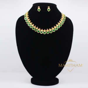 Green Lavanya Necklace Set with Ruby Red Stone is a traditionally andcrafted south Indian one gram gold jewellery