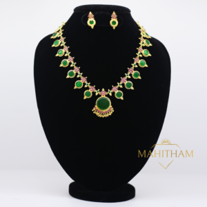 Green Aarathana Necklace with Ruby Red Stones Set is a traditional south Indian one gram gold jewellery for women