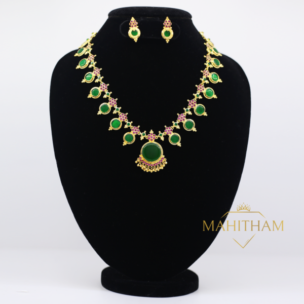 Green Aarathana Necklace with Ruby Red Stones Set is a traditional south Indian one gram gold jewellery for women