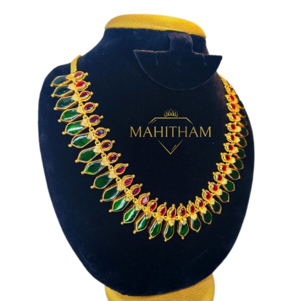 Green Nagapadam Necklace with Red AD Stones by Mahitham Jewellery