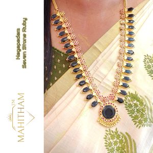 Mahitham Nagapadam Flower Ruby Necklace MG-2267 worn with traditional saree, ruby flower motifs and black nagapadam drops