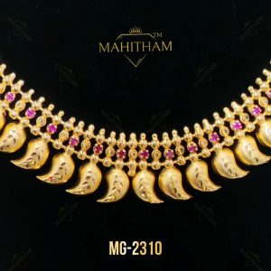 Close-up of Mahitham MG-2310 gold finish mango mala featuring engraved mango motifs, ruby stones and handcrafted traditional Kerala necklace details