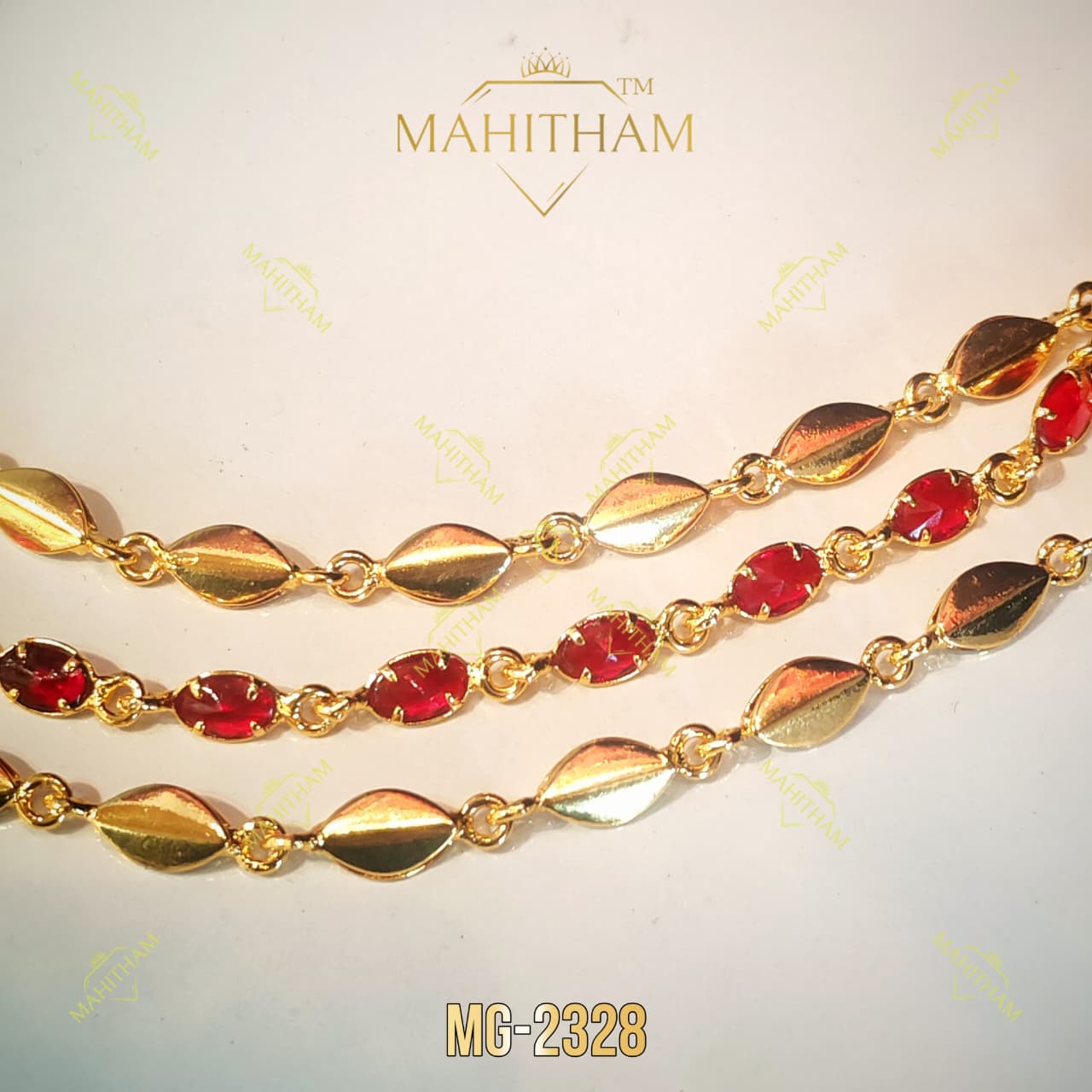 Mahitham MG-2328 three-layer Avil chain necklace with red oval stones and gold-finish leaf links_1