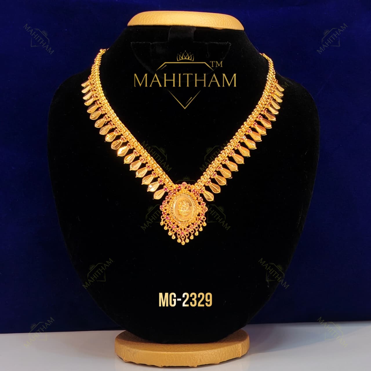 Mahitham Golden Nagapadam Necklace MG-2329 with central Lakshmi pendant and ruby-pink