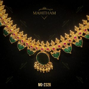 Full view of Green Palakka Ruby Necklace MG-2326 displayed on a black jewellery bust with traditional gold-finish detailing.